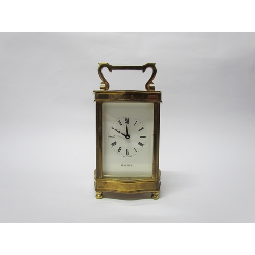 8081 - Two modern brass cased carriage timepieces retailed by H. Samuel and Dipples (one with greenbox) (2)... 