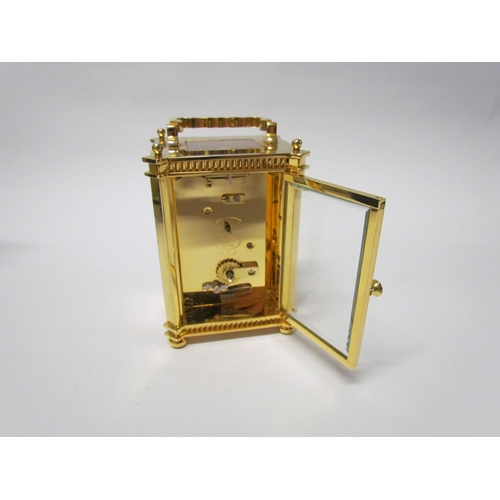 8081 - Two modern brass cased carriage timepieces retailed by H. Samuel and Dipples (one with greenbox) (2)... 