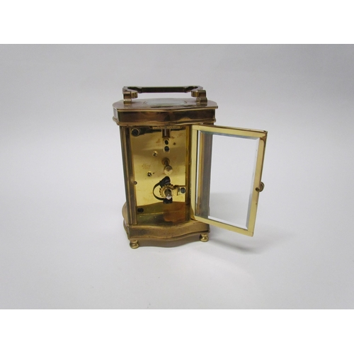 8081 - Two modern brass cased carriage timepieces retailed by H. Samuel and Dipples (one with greenbox) (2)... 