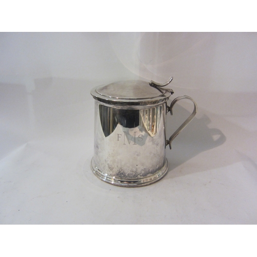 1429 - A silver plated ice bucket as tankard, 21cm tall