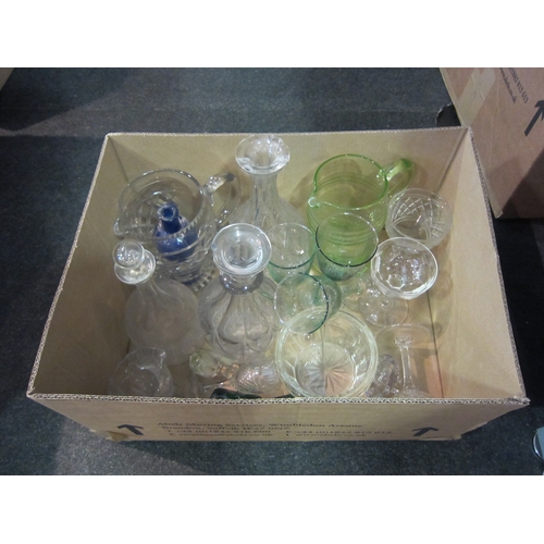 1454 - Two boxes of mixed glassware including decanters, jugs, etc