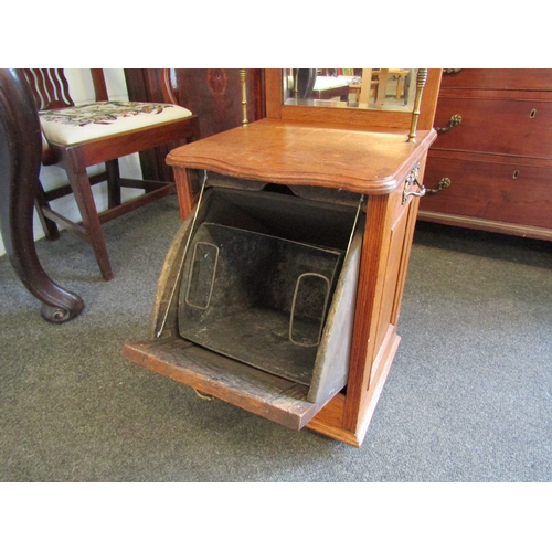 1007A - A Victorian oak coal purdonium with mirrored back and raised gallery, 74cm tall x 35cm wide x 33cm d... 