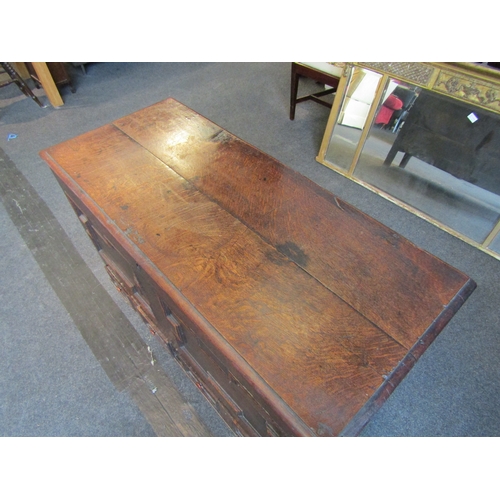 1015 - A late 17th/early 18th Century oak geometric panel mule chest with two drawers, 78cm tall x 115cm wi... 