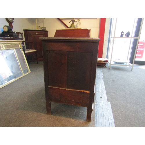 1015 - A late 17th/early 18th Century oak geometric panel mule chest with two drawers, 78cm tall x 115cm wi... 