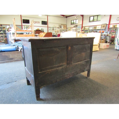 1015 - A late 17th/early 18th Century oak geometric panel mule chest with two drawers, 78cm tall x 115cm wi... 