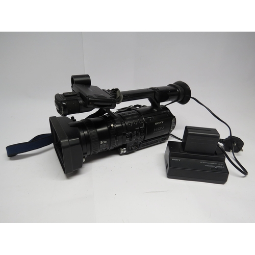 7419 - A Sony HDV digital HD video camera recorder, model no. HVR-Z1E, with AC adapter/charger and two batt... 