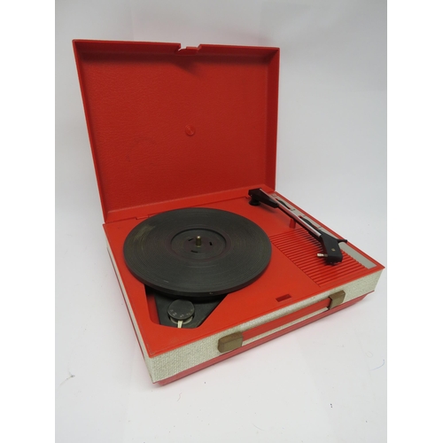 7364 - A vintage Fidelity HF42 portable record player in red plastic casing