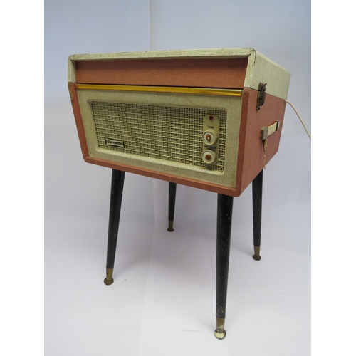 7382 - A mid 20th Century Dansette Bermuda record player with Monarch turntable, raised on round tapering l... 