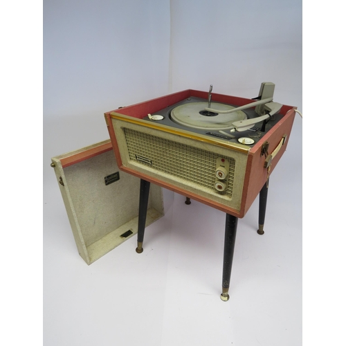 7382 - A mid 20th Century Dansette Bermuda record player with Monarch turntable, raised on round tapering l... 