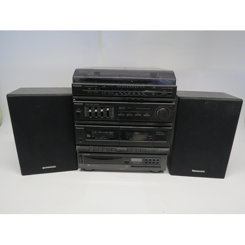 7379 - A Panasonic SG-HM09A compact audio system comprising turntable/tuner, amplifier, twin cassette deck ... 