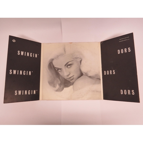 7034 - DIANA DORS: 'Swnigin Dors' LP, original 1960 UK release on red vinyl, housed in novelty front openin... 