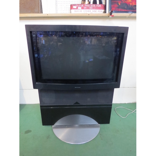 7338 - A Bang & Olufsen Beovision Avant television with remote (missing battery cover)