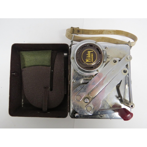 7266 - A Mikkyphone portable gramophone with original soundbox, folding tri-spoke turntable, in metal case ... 