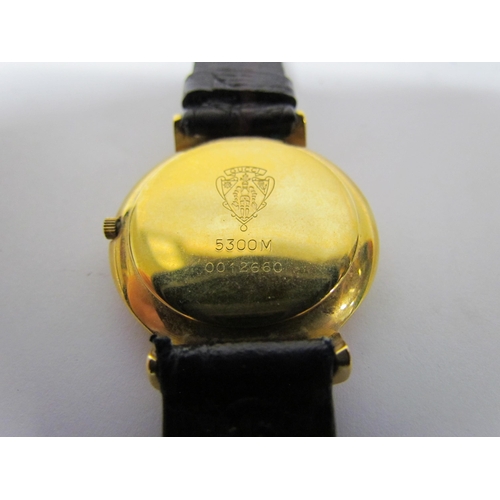 8174 - A lady's Gucci wristwatch model No. 5300M, leather strap and spare, date aperture, boxed with paperw... 