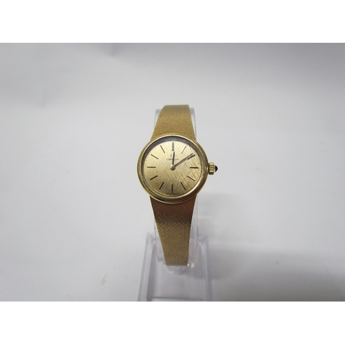 8144 - A lady's Omega 9ct gold wristwatch, baton makers, inside case marked Omega Watch Co 7290, 034, 29.3g