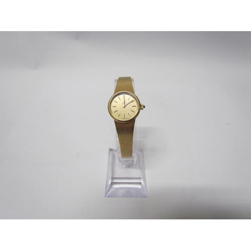 8144 - A lady's Omega 9ct gold wristwatch, baton makers, inside case marked Omega Watch Co 7290, 034, 29.3g