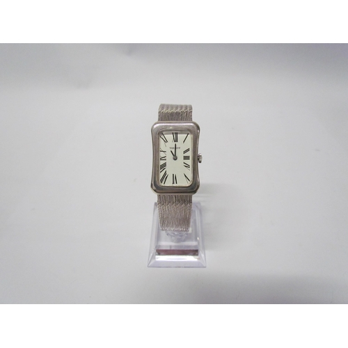 8137 - A Tissot silver wristwatch of cushion style, Deco form face, snake link strap, cased