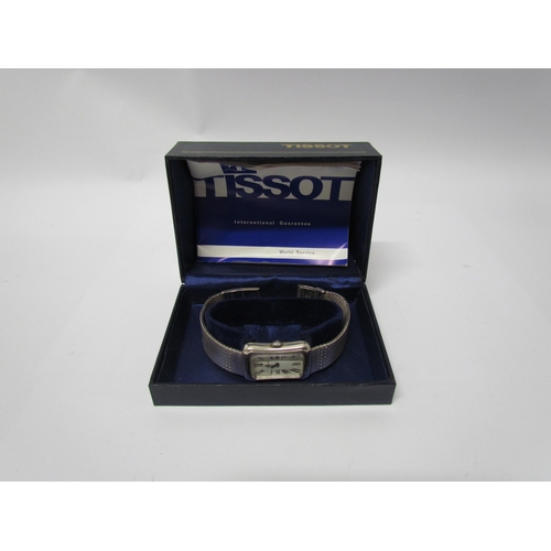 8137 - A Tissot silver wristwatch of cushion style, Deco form face, snake link strap, cased