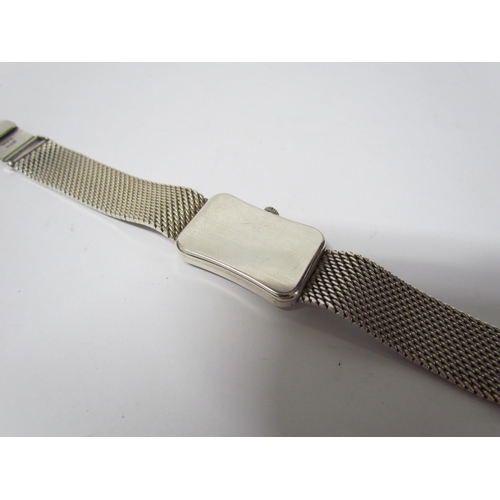 8137 - A Tissot silver wristwatch of cushion style, Deco form face, snake link strap, cased