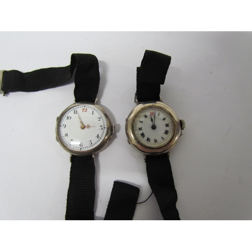 8138 - Two early 20th Century silver watches with silk straps one marked 925 date mark for 1916 the other 9... 