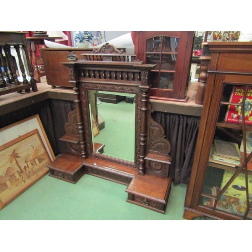 4051 - A 19th Century carved oak bevel edge dressing chest mirror with turned decoration over breakfront ba... 