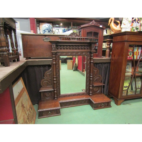 4051 - A 19th Century carved oak bevel edge dressing chest mirror with turned decoration over breakfront ba... 