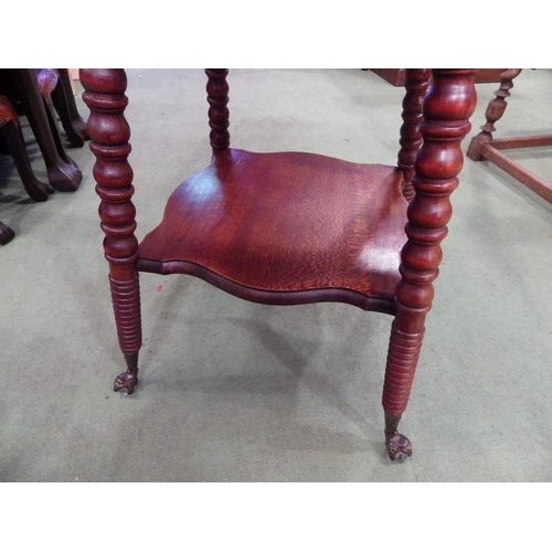 4110 - A circa 1900 two tier lamp table, the square top on ring turned bobbin legs and glass ball in brass ... 