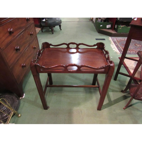 4190 - A George III revival mahogany tray on stand occasional table with raised fretwork gallery over chamf... 