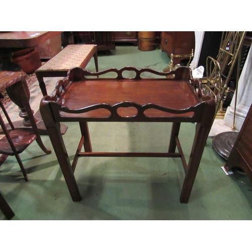 4190 - A George III revival mahogany tray on stand occasional table with raised fretwork gallery over chamf... 