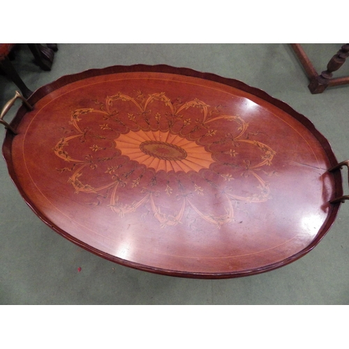 4207 - A 19th Century inlaid mahogany wavy gallery oval tray top table, the scroll brass handles over squar... 