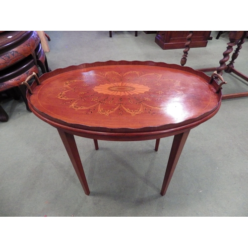 4207 - A 19th Century inlaid mahogany wavy gallery oval tray top table, the scroll brass handles over squar... 