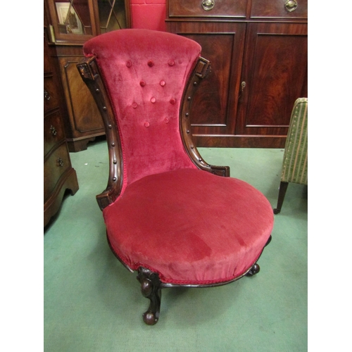 4209 - A mid-Victorian rosewood bedroom chair with carved and turned decoration the bow front seat on Frenc... 