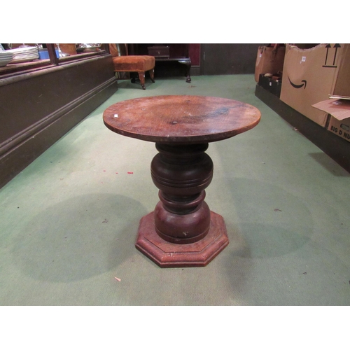 4218 - A small oak pedestal, 36cm tall x 34cm diameter