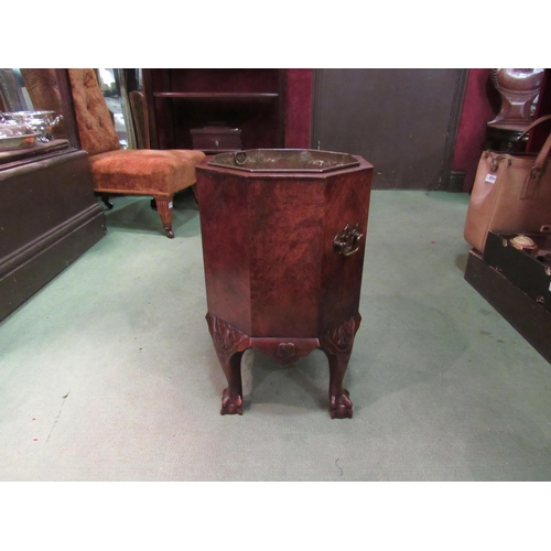 4219 - A George II style burr walnut octagonal shape wine cooler with tin liner on ball in claw carved cabr... 