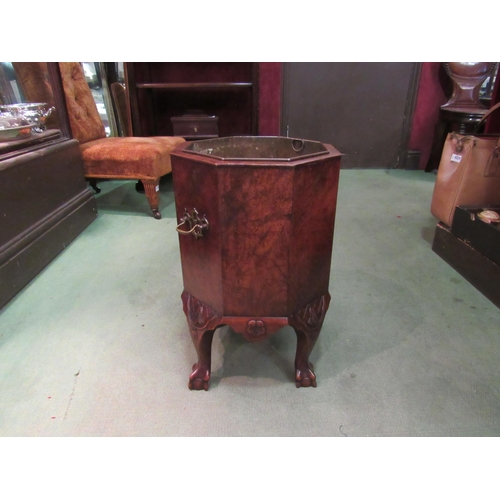 4219 - A George II style burr walnut octagonal shape wine cooler with tin liner on ball in claw carved cabr... 