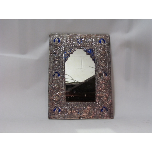 4263 - A Persian white metal and blue enamel mirror, 31cm x 23cm total