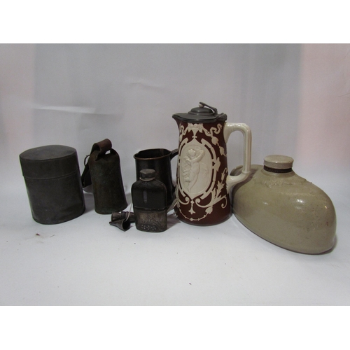 4288 - A pewter tea canister, Georgian tankard, cow bell, flask, stoneware hot water bottle and Victorian j... 