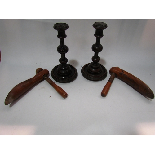 4287 - A pair of Victorian wooden candlesticks and a pair of wooden shoe stretchers     (R) £15