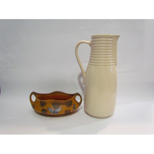 4408 - A Susie Cooper Art Deco cream jug (a/f), ridged form neck, 35cm tall, and a Brentleigh Ware twin han... 