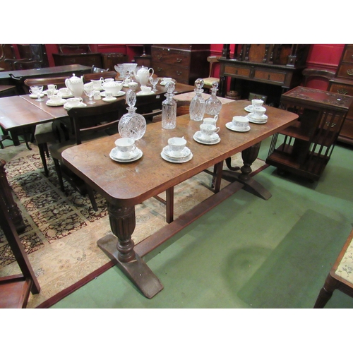 4168 - An oak serving table, carved supports on stretcher base, 74cm tall x 168cm long x 56cm wide