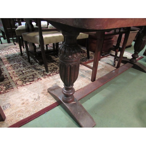 4168 - An oak serving table, carved supports on stretcher base, 74cm tall x 168cm long x 56cm wide