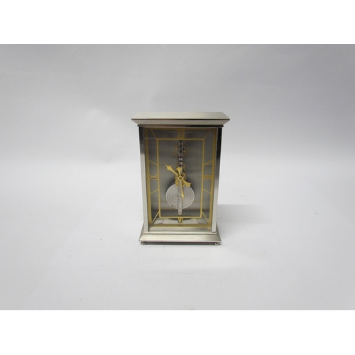 8083 - A Jaeger Le Coultre No. 481 mantel clock, visible skeleton movement set with rubies, stainless steel... 