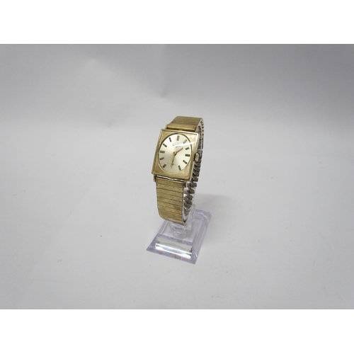 8132 - A Longines 10K gold filled rectangular watch with oval face, baton numerical marks, second dial on b... 