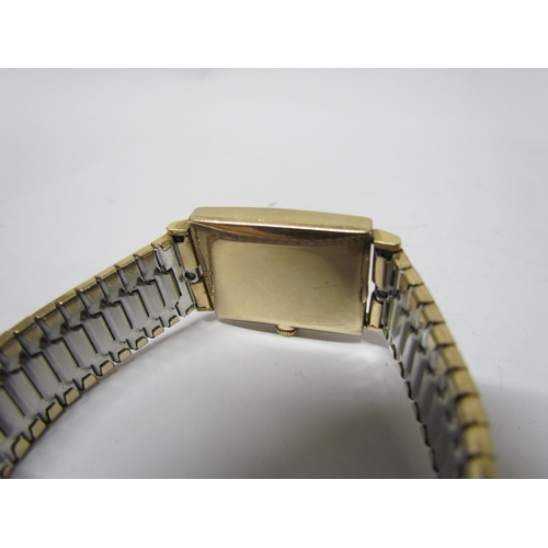 8132 - A Longines 10K gold filled rectangular watch with oval face, baton numerical marks, second dial on b... 