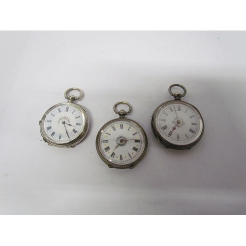 8113 - Two Continental silver fob watches and English silver cased London 1882. Decorative cases floral emb... 