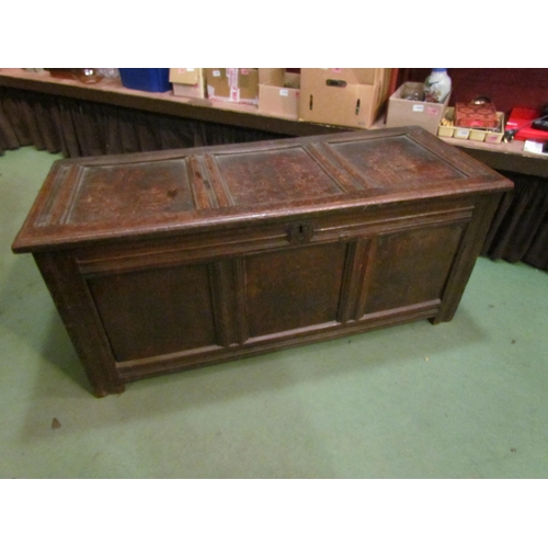 4003 - A late 17th/early 18th Century oak three panel coffer, candle box compartment interior, stile feet, ... 