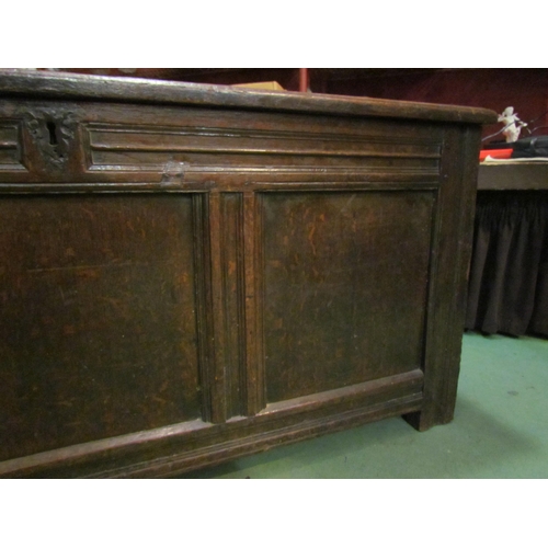 4003 - A late 17th/early 18th Century oak three panel coffer, candle box compartment interior, stile feet, ... 