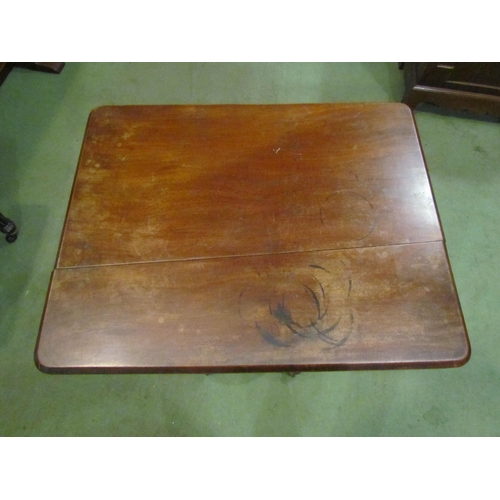 4043 - A mahogany tilt-top pedestal table on scroll feet, top a/f, 73cm tall x 60cm long x 47cm wide