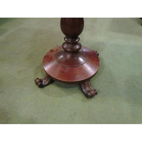 4043 - A mahogany tilt-top pedestal table on scroll feet, top a/f, 73cm tall x 60cm long x 47cm wide