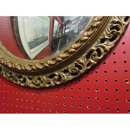 4044 - A mid-20th Century circular convex mirror, gilt acanthus leaf frame, 52cm diameter total